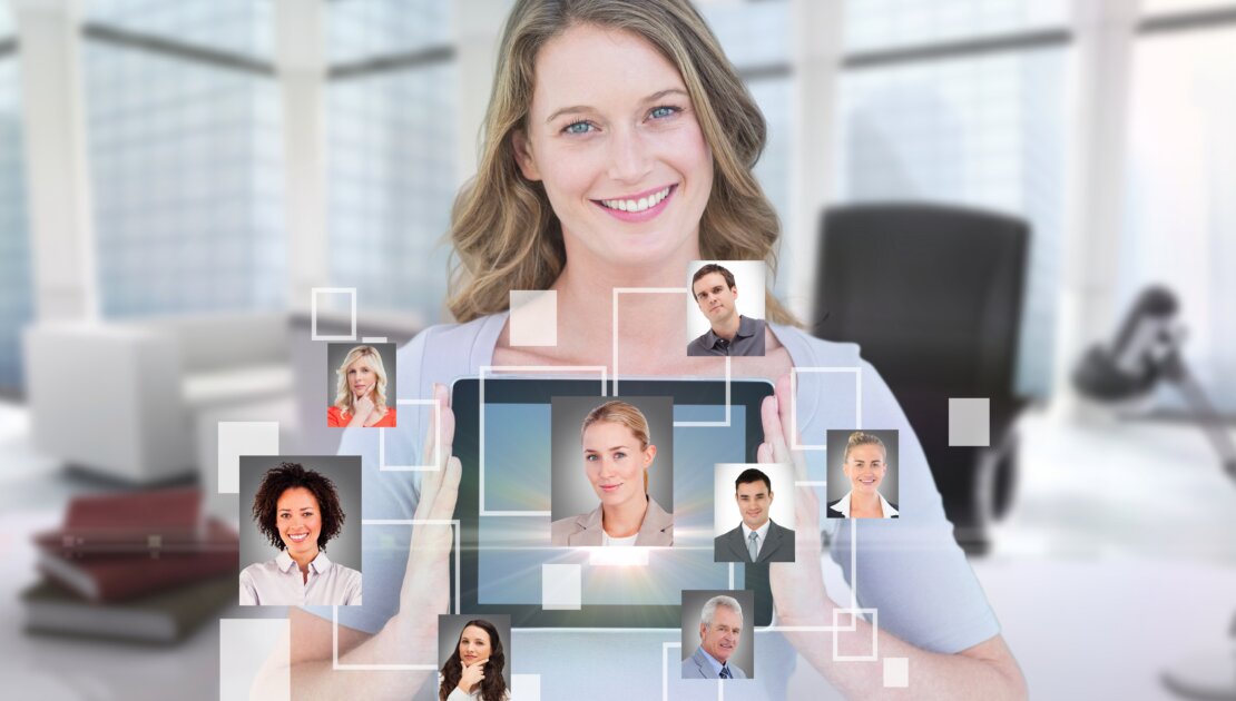 Smiling Businesswoman Showing Her Tablet With Virtual App