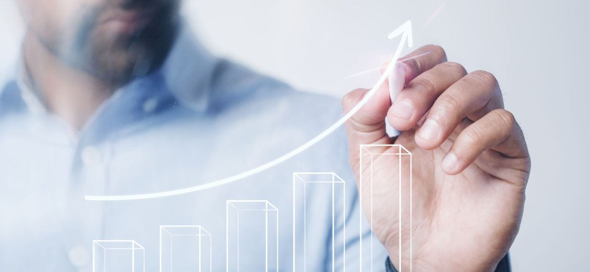 Man giving a business presentation using a high technology digit