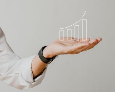 Presenting arm isolated on beige