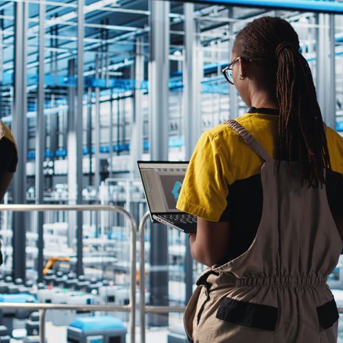 Engineering team working in smart factory, collecting and analyzing data