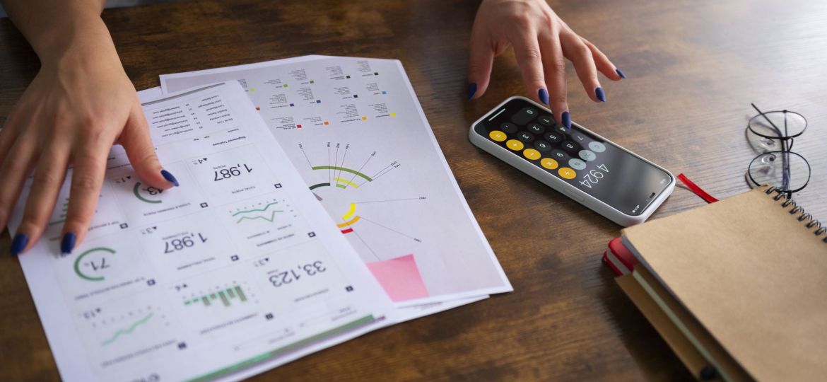 high-angle-woman-working-as-economist