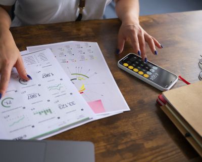high-angle-woman-working-as-economist